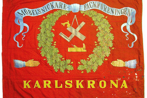 Fana som är röd och med texten möbelsnickare- fackföreningen Karlskrona.