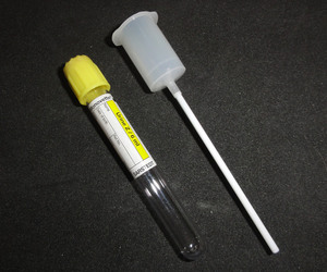 Urinrör med gul propp, överföringsstrå